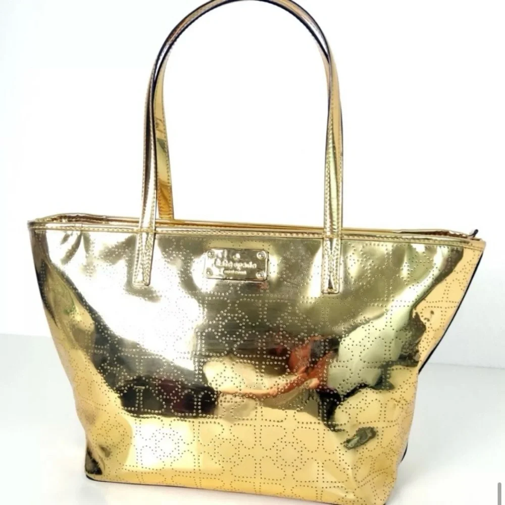 Kate Spade 2pc set Metro Spade Gold Tote and matching NWT Shiloh Pouch Set $356